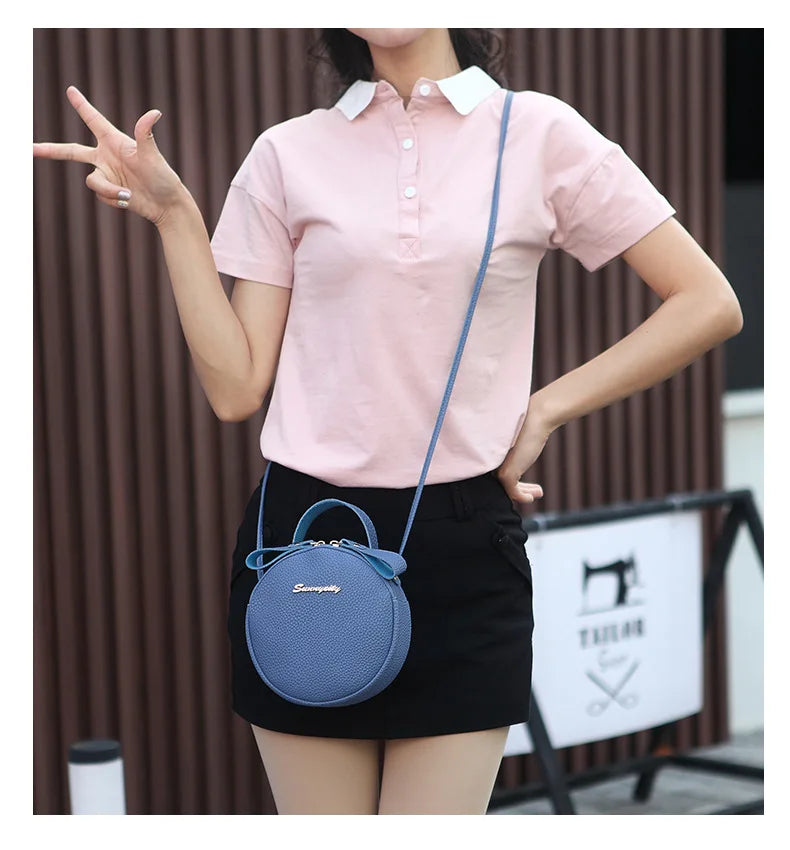 New handbag cute little round bag shoulder diagonal bag portable cosmetic bag foreign trade wholesale small bag. Women's bag