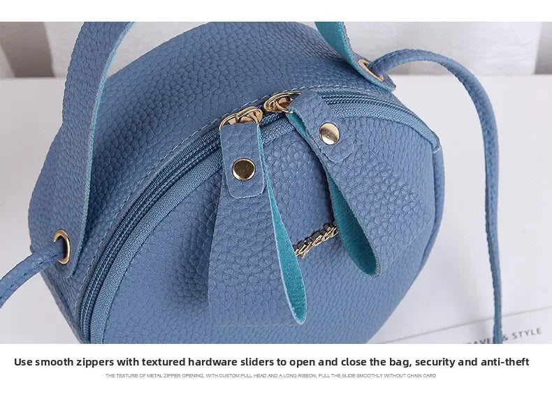 New handbag cute little round bag shoulder diagonal bag portable cosmetic bag foreign trade wholesale small bag. Women's bag