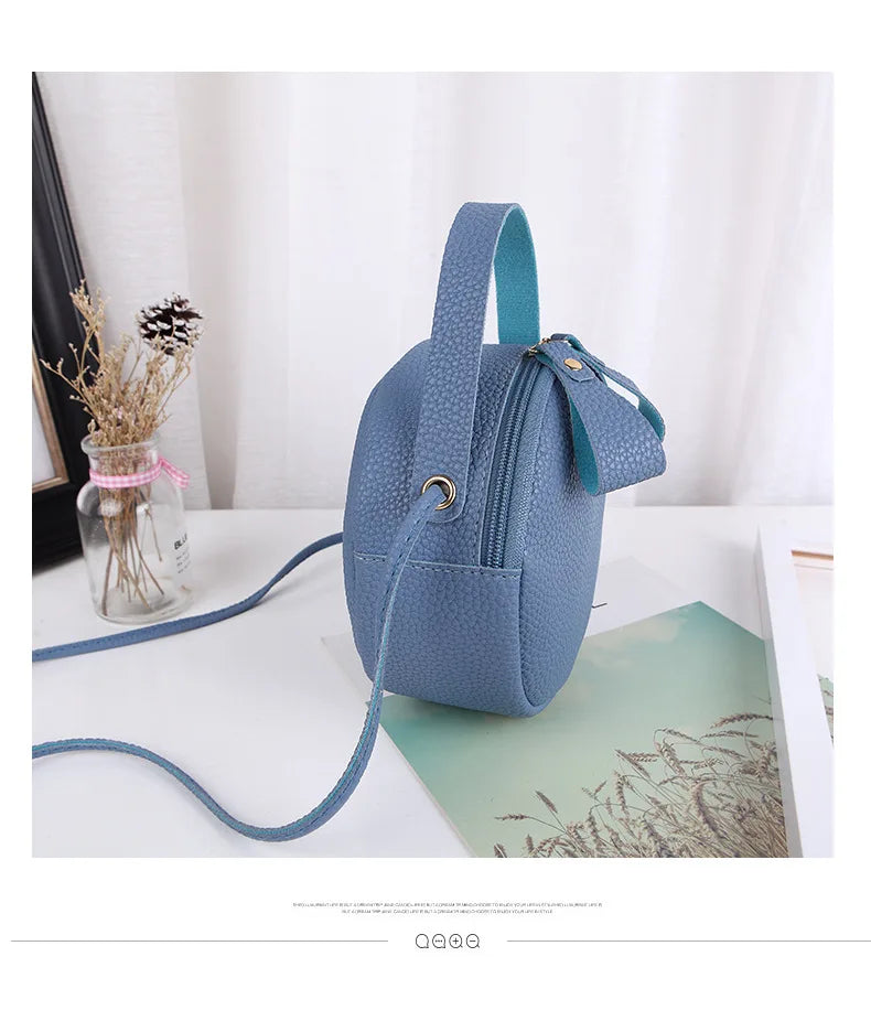 New handbag cute little round bag shoulder diagonal bag portable cosmetic bag foreign trade wholesale small bag. Women's bag