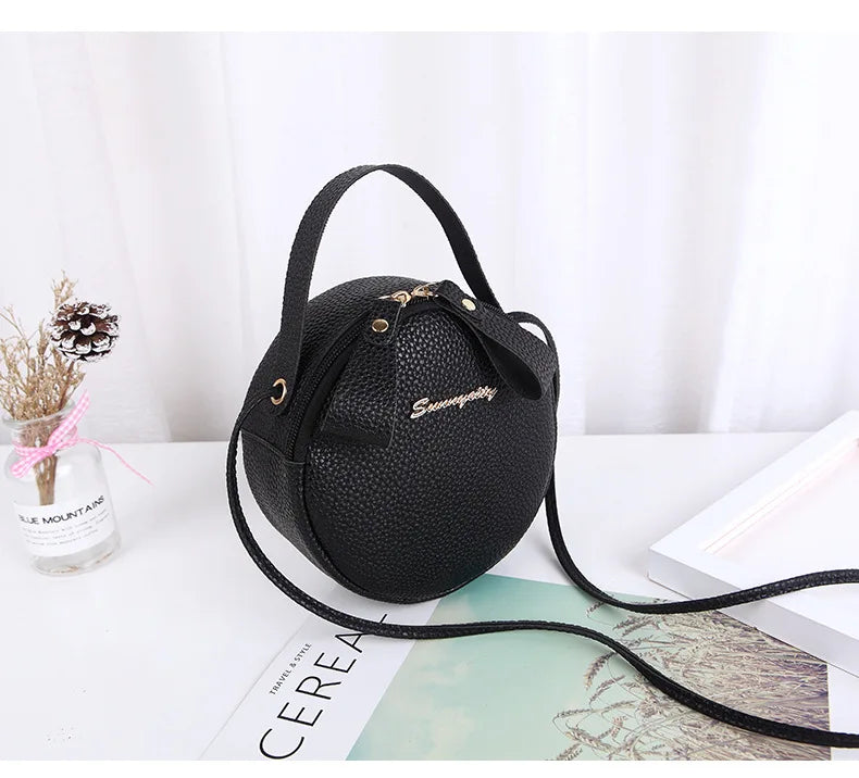 New handbag cute little round bag shoulder diagonal bag portable cosmetic bag foreign trade wholesale small bag. Women's bag