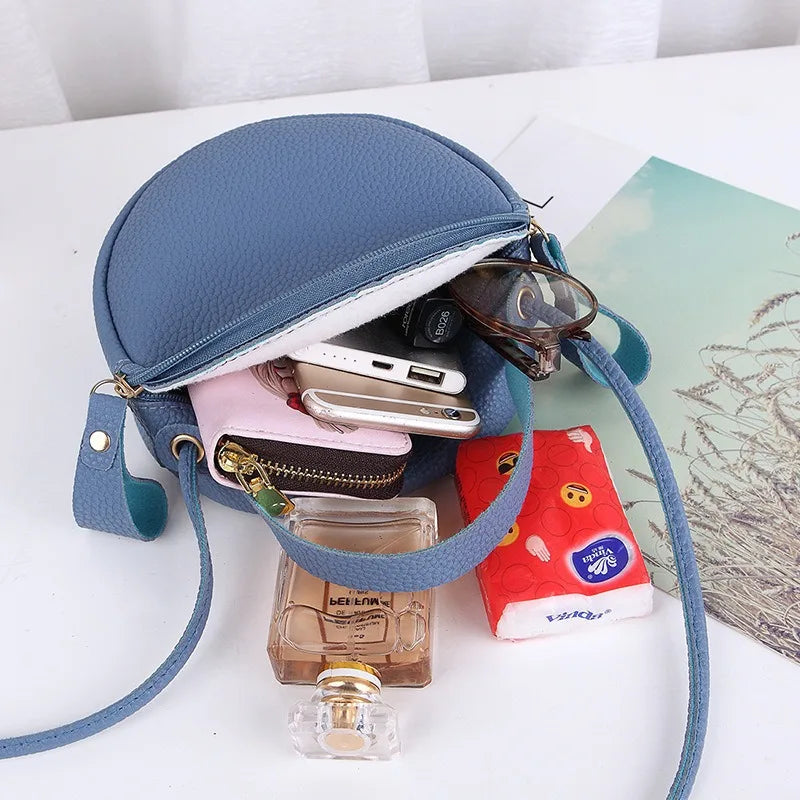 New handbag cute little round bag shoulder diagonal bag portable cosmetic bag foreign trade wholesale small bag. Women's bag