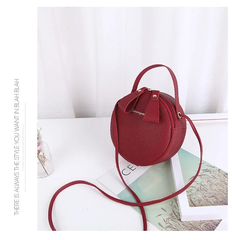 New handbag cute little round bag shoulder diagonal bag portable cosmetic bag foreign trade wholesale small bag. Women's bag