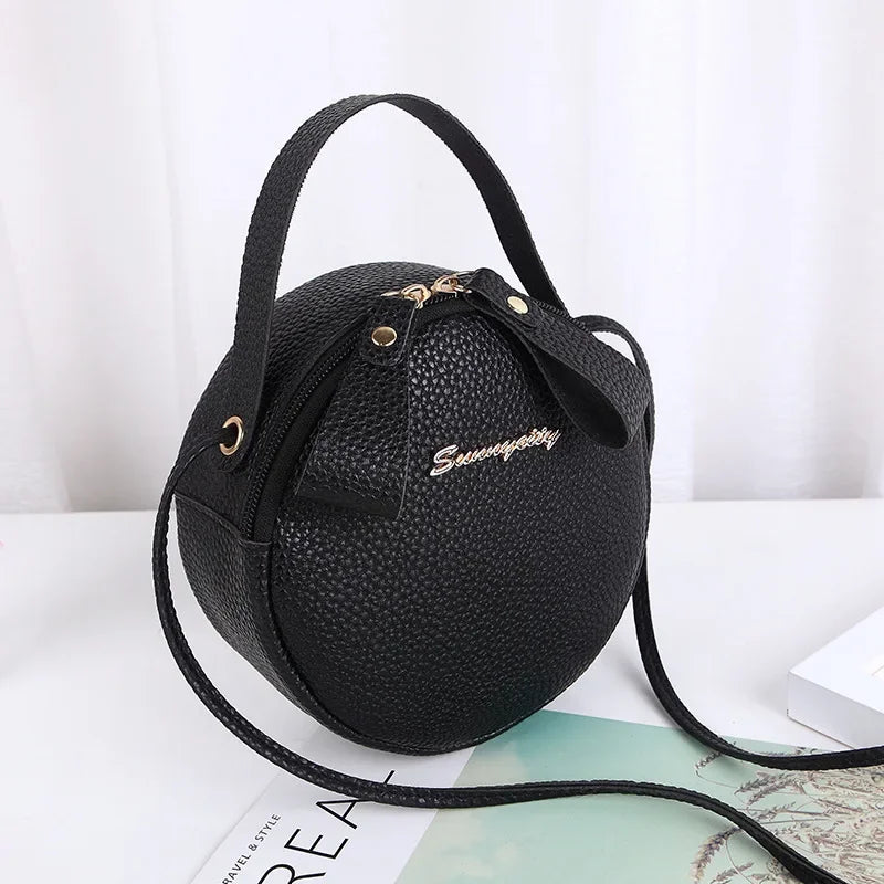 New handbag cute little round bag shoulder diagonal bag portable cosmetic bag foreign trade wholesale small bag. Women's bag