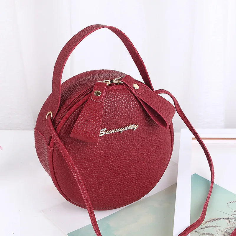 New handbag cute little round bag shoulder diagonal bag portable cosmetic bag foreign trade wholesale small bag. Women's bag