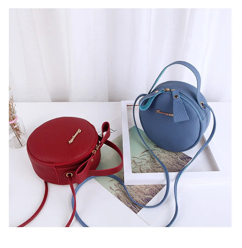 New handbag cute little round bag shoulder diagonal bag portable cosmetic bag foreign trade wholesale small bag. Women's bag