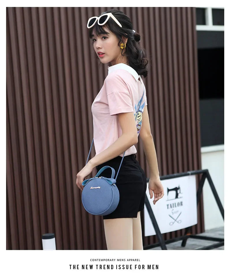 New handbag cute little round bag shoulder diagonal bag portable cosmetic bag foreign trade wholesale small bag. Women's bag