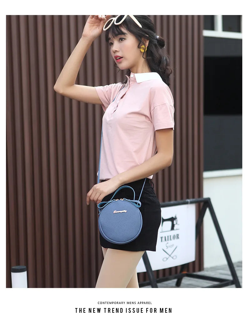 New handbag cute little round bag shoulder diagonal bag portable cosmetic bag foreign trade wholesale small bag. Women's bag